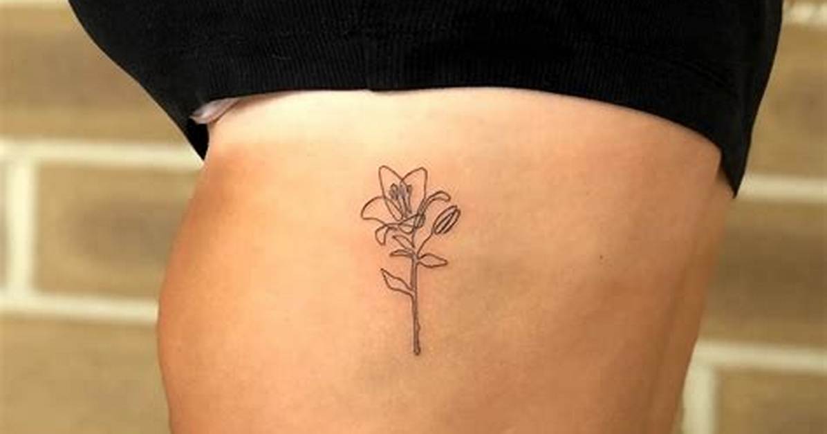 Alluring Flower Rib Tattoos: Delicate Designs That Bloom on Your Body